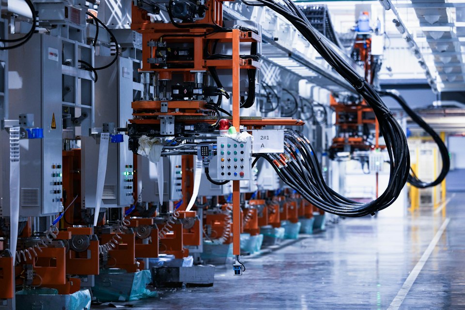 A line of industrial electrical switchgear panels