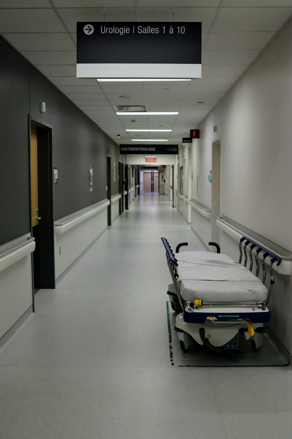 Hospital corridor with patient beds